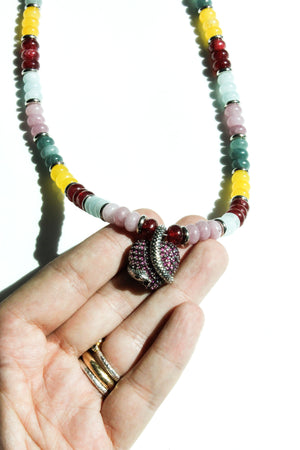 16-inch beaded necklace featuring jade, aquamarine, rose quartz, and sterling silver heart centerpiece